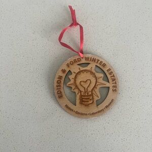 Wooden Ornament with Red Ribbon